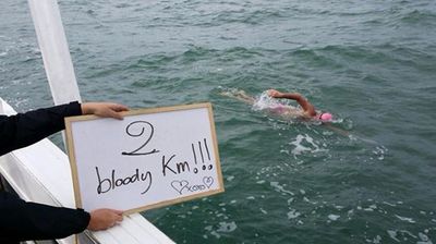 25 July 2014 – Large man in pink swims to France